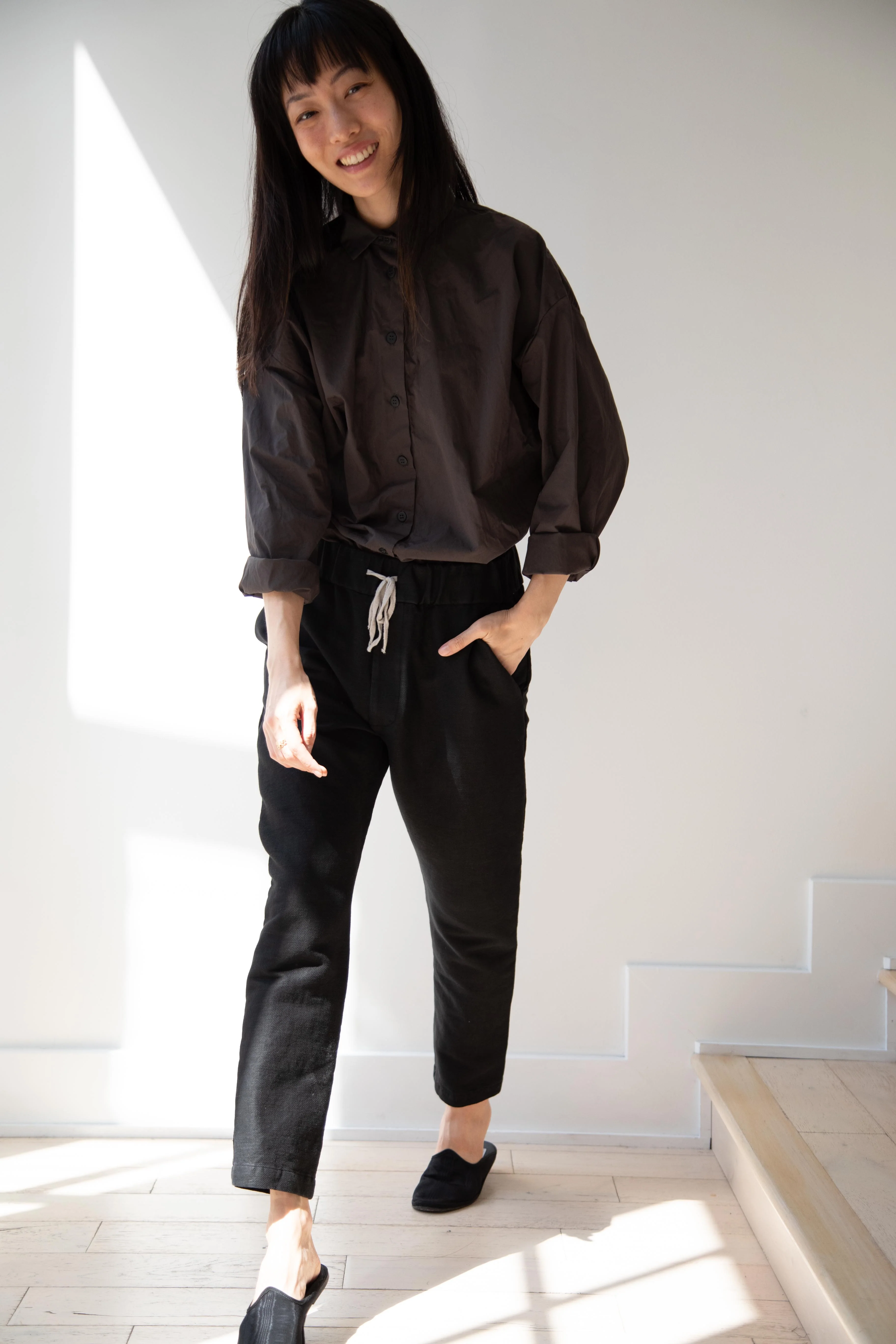 Album di Famiglia | Slim Wool Stretch Trousers in Black - Image 14