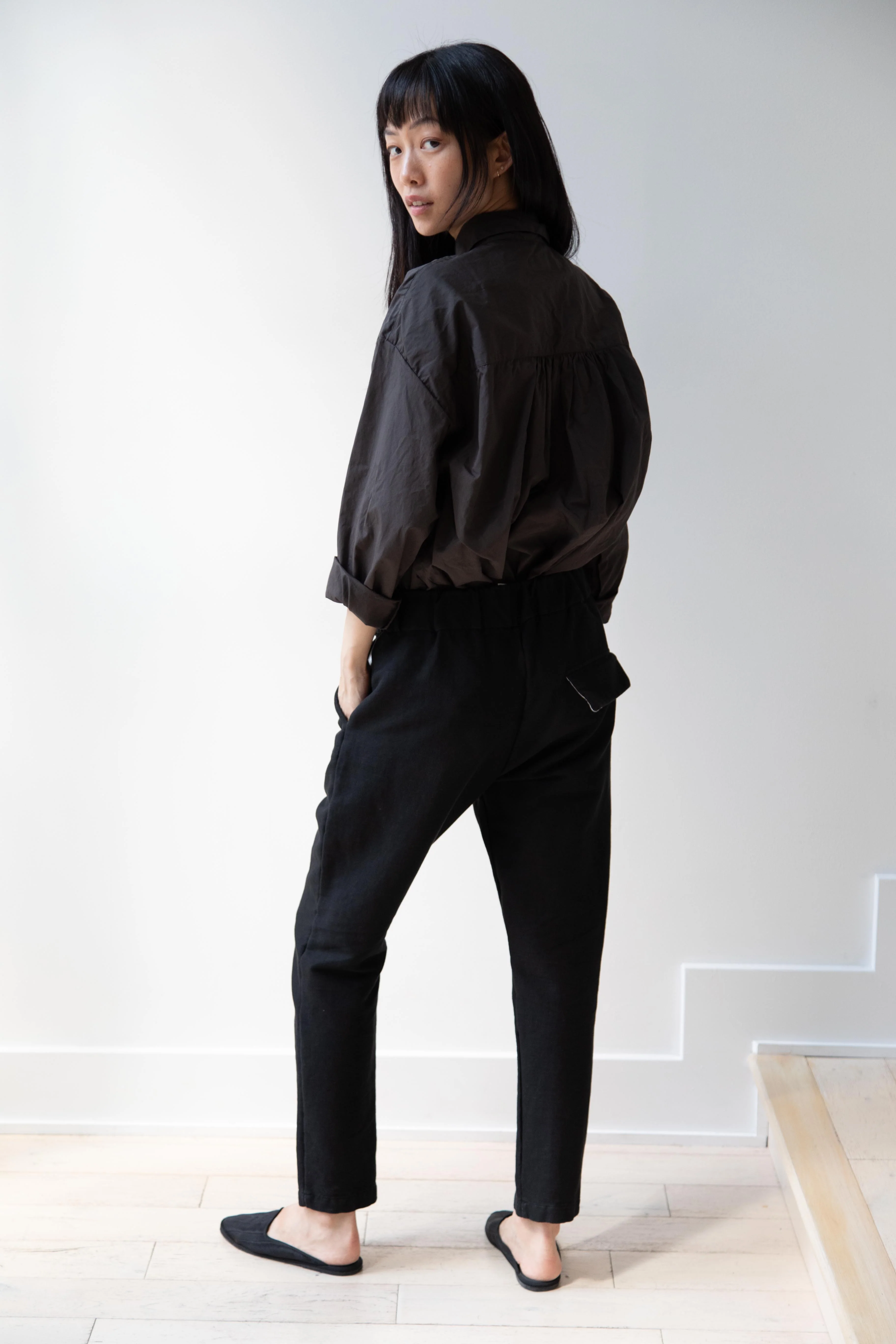 Album di Famiglia | Slim Wool Stretch Trousers in Black - Image 18
