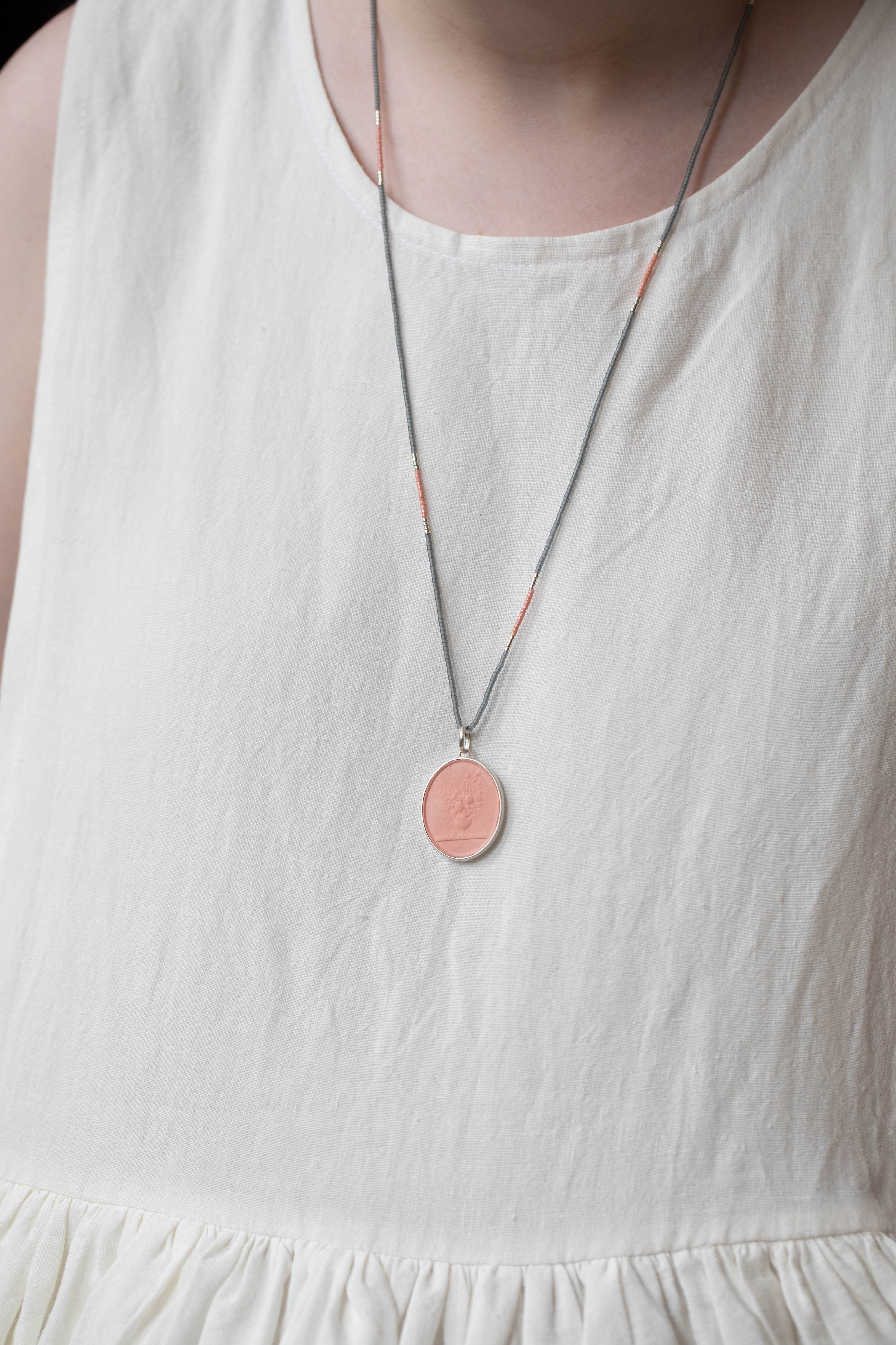 Marcie McGoldrick | Handset Cameo Necklace Vase with Flowers in Coral - Image 9